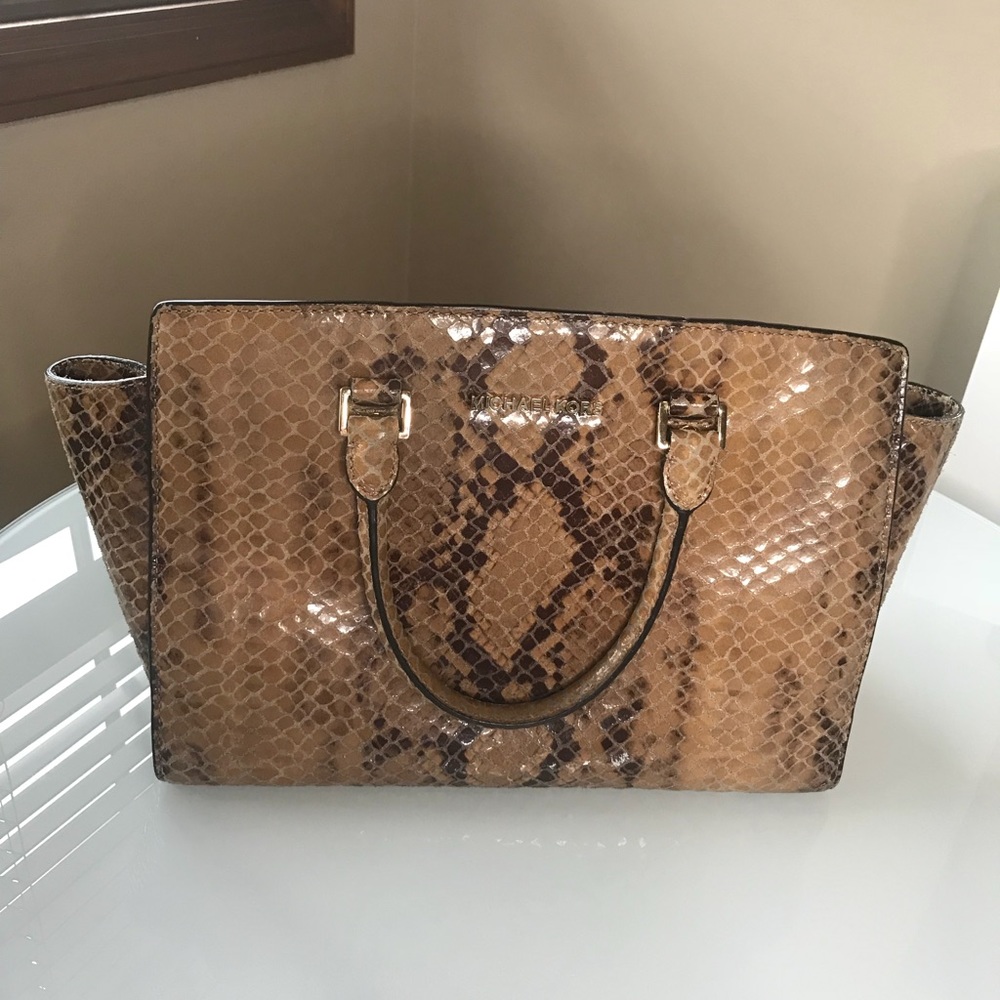Snake print Michael Kors Selma satchel.